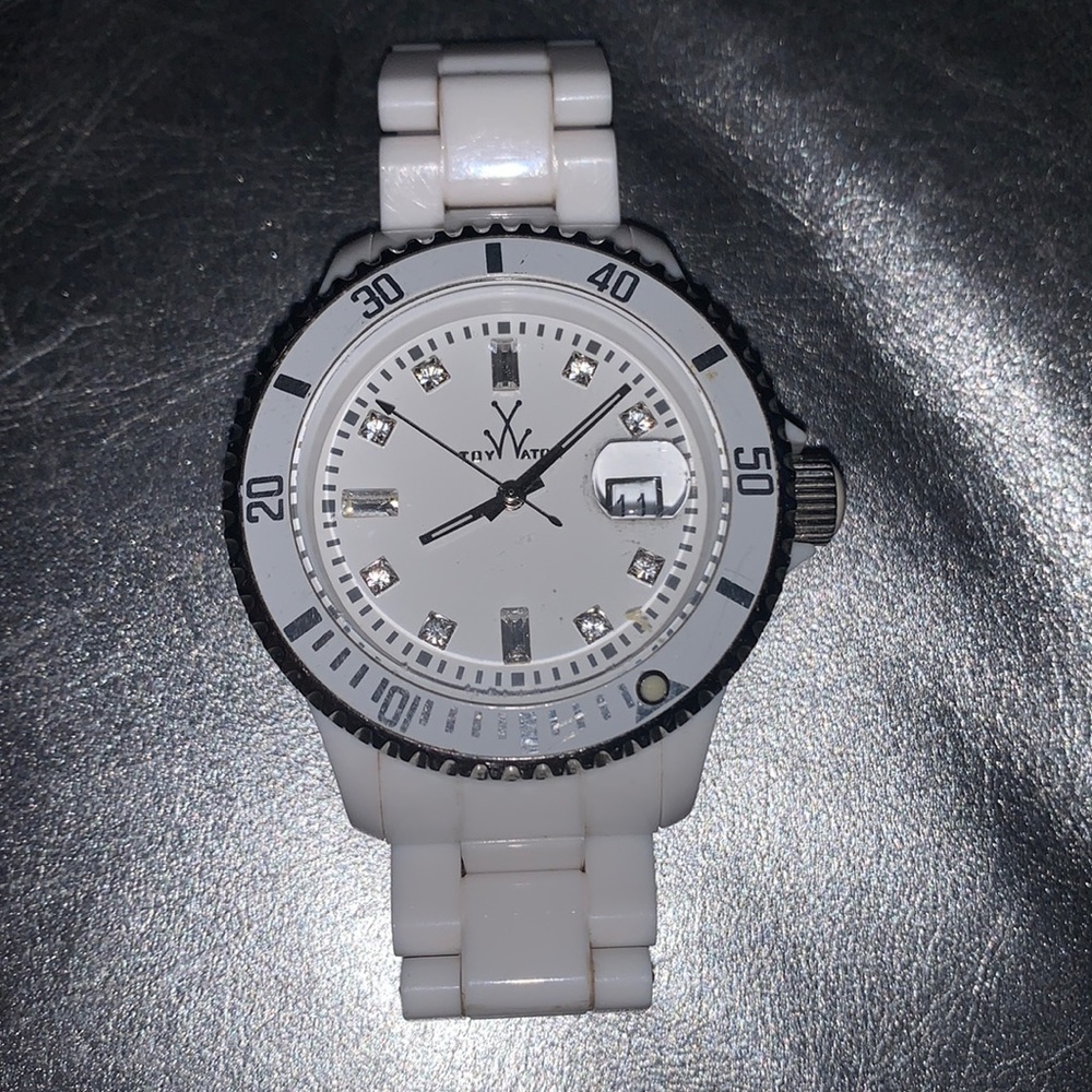 white toy watch